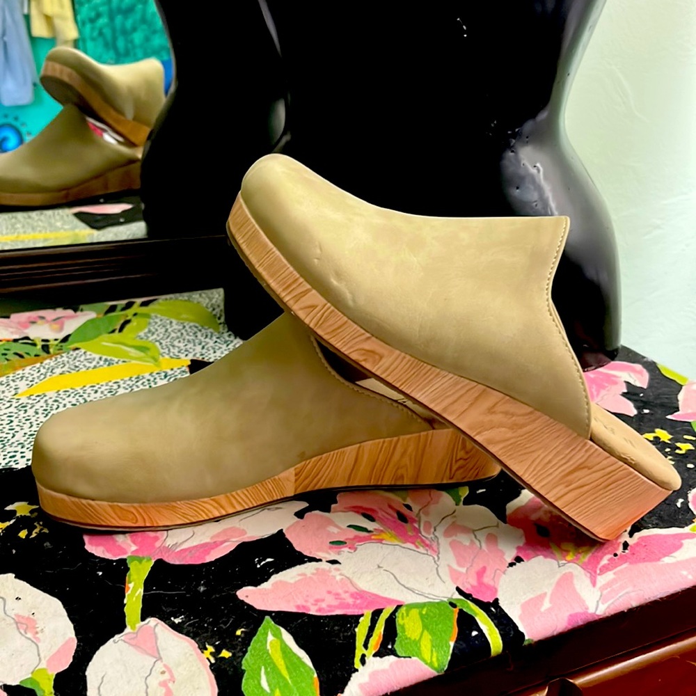Suede clog with wood heal.